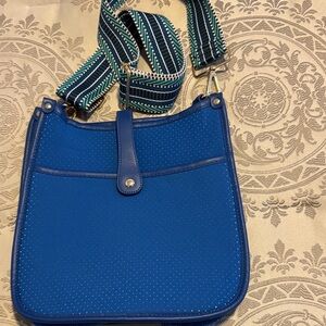 Elegant Blue Crossbody Bag with Patterned Strap